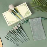 Petra store 13-Piece Makeup Brush Set with green handles and matching drawstring pouch