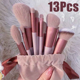 Petra store 13-Piece Makeup Brush Set with soft rose gold and pink handles in a beige pouch