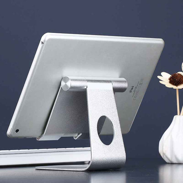Petra store silver aluminum Stand For iPads and Tablets supporting an iPad in a workspace