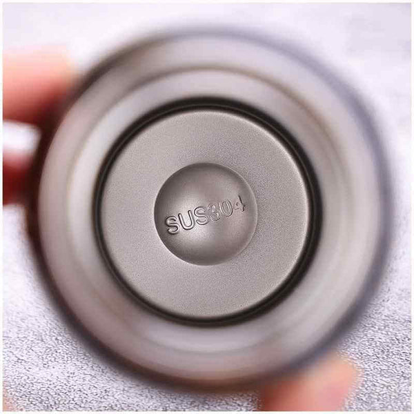Close-up view inside Petra store stainless steel Bike Water Bottle showing SUS 304 marking
