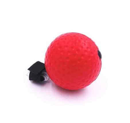Red Boxing Reflex Speed Punch Ball with textured surface and black strap for training reflexes