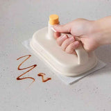 Petra store Cleaning Magic Brush with handle removing stain from countertop surface