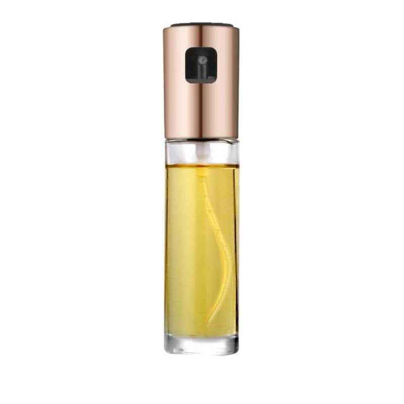 Petra store cooking oil spray bottle with clear glass body and rose gold top for kitchen use