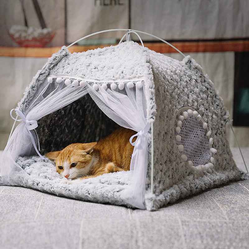 Cozy pet bed for small pets by Petra store with soft gray fabric and decorative white curtains