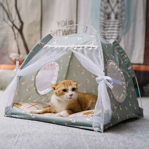 Cozy pet bed for small pets by Petra store featuring a soft tent design with mesh windows and a resting cat inside