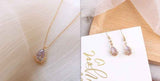 Crystal Water Drop Pendant Necklace and matching earrings with gold chain from Petra store