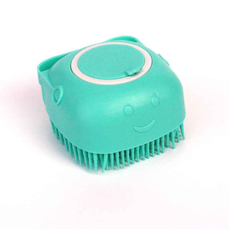 Petra store teal silicone dog bath brush with soft bristles and ergonomic design
