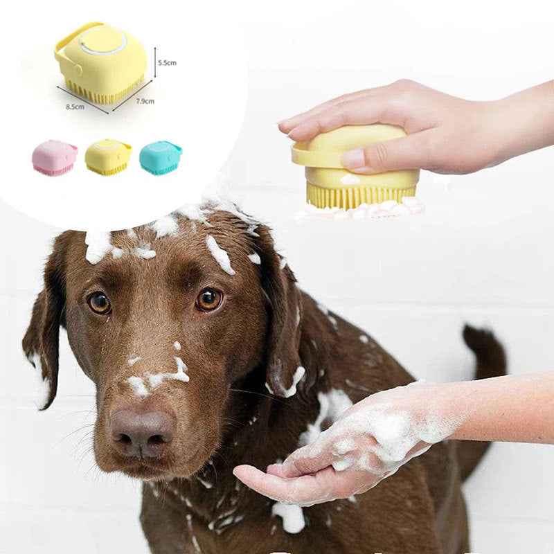 Petra store Dog Bath Brush in yellow used to lather soap on a brown dog during bath time