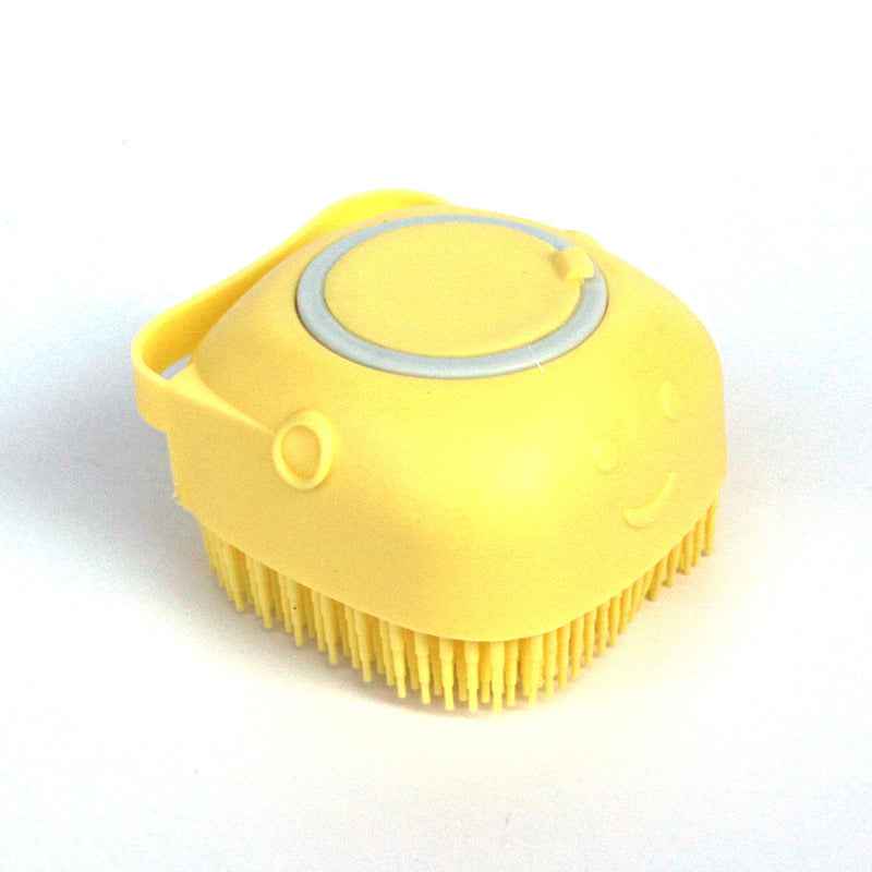 Yellow Petra store Dog Bath Brush with soft silicone bristles and ergonomic handle for pet grooming