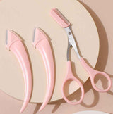 Petra store Eyebrow Trimming Knife With Comb and two pink eyebrow shaving razors on beige background