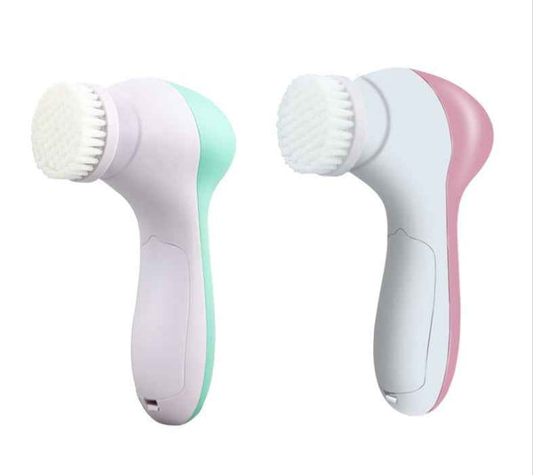 Petra store facial massager with soft bristles in pastel green and pink for gentle skin cleansing