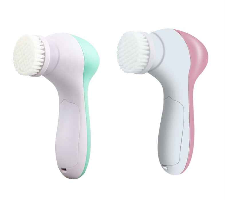 Petra store facial massager with soft bristles in pastel green and pink for gentle skin cleansing