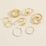 Petra store gold and pearl Flower Ring Set with delicate floral and twisted band designs