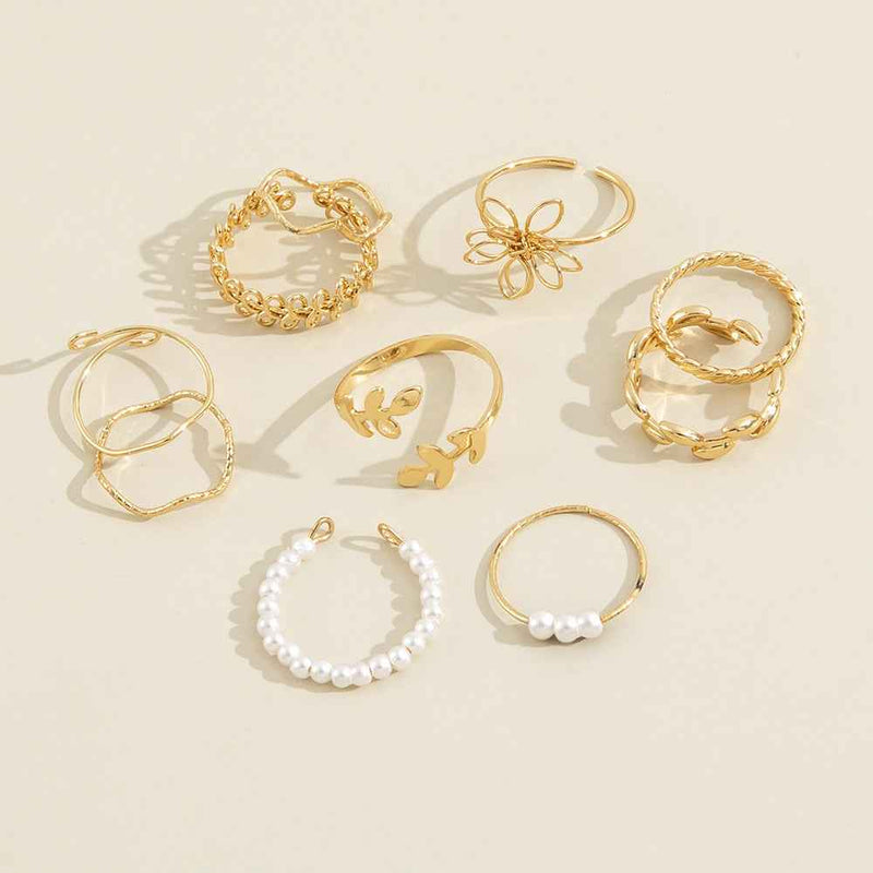 Petra store gold and pearl Flower Ring Set with delicate floral and twisted band designs