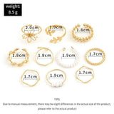 Petra store Flower Ring Set with 10 gold-tone rings featuring floral, leaf, and pearl designs