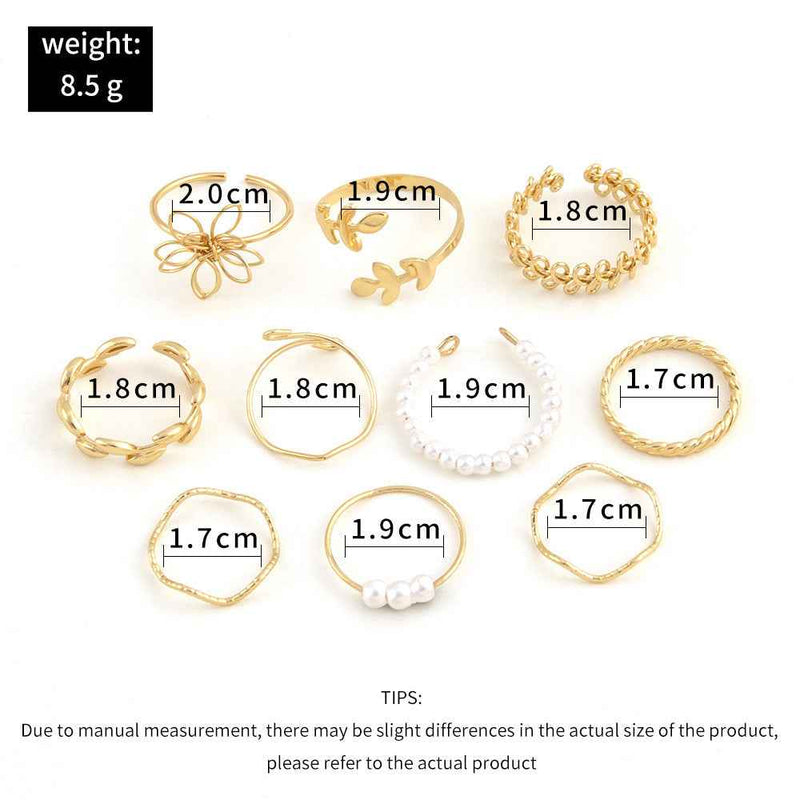Petra store Flower Ring Set with 10 gold-tone rings featuring floral, leaf, and pearl designs