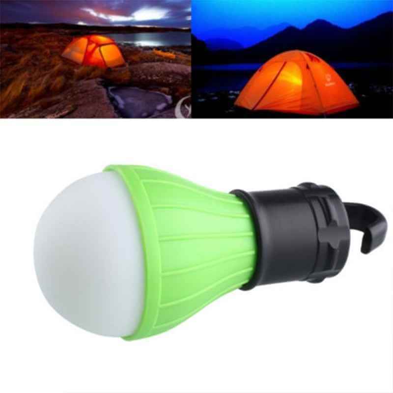 Petra store portable green and black camping tent lights glowing inside orange tents at night