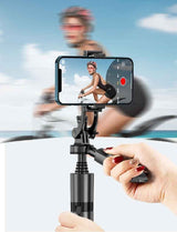 Petra store Gimbal Smartphone Holder stabilizing phone for smooth video of cyclist riding bike