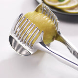 Stainless steel lemon slicer from Petra store cutting a lemon for easy and uniform slices
