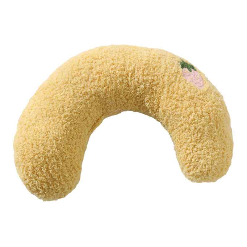 Petra store Little Pillow For Pets in yellow crescent shape with soft plush texture