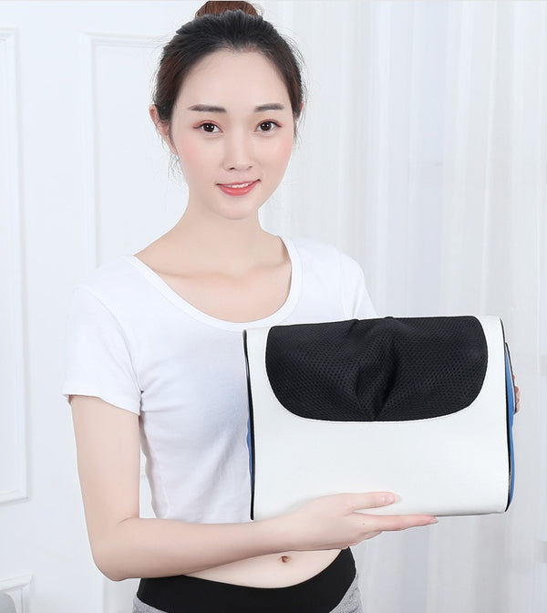 Woman holding Petra store massage pillow in white and black for beauty and skincare relaxation
