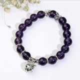 Natural opal beads bracelet with deep purple round beads and silver charm from Petra store