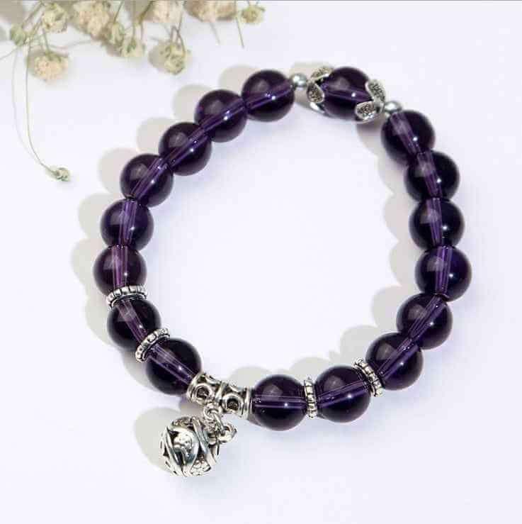 Natural opal beads bracelet with deep purple round beads and silver charm from Petra store