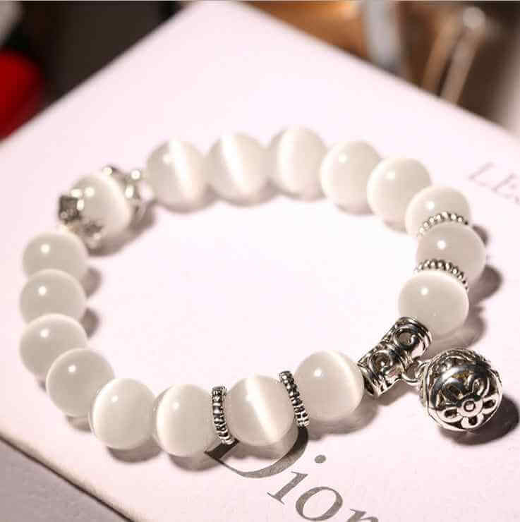 Natural opal beads bracelet with white round stones and silver decorative accents from Petra store
