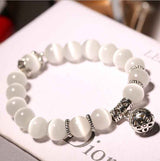Natural opal beads bracelet with silver decorative charms from Petra store fashion accessories