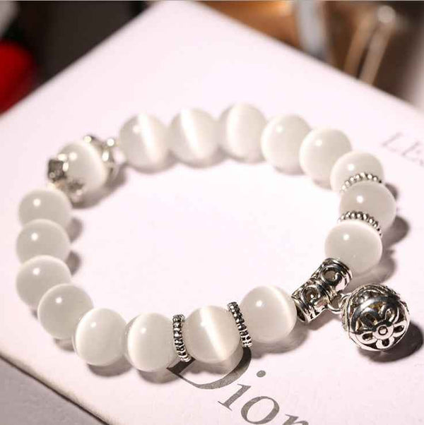 Natural opal beads bracelet with silver decorative charms from Petra store fashion accessories
