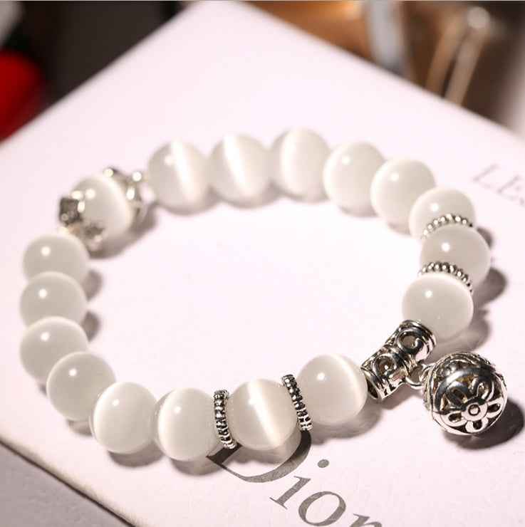 Natural opal beads bracelet with silver decorative charms from Petra store fashion accessories