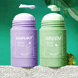 Petra store Cleansing Green Tea Mask stick in green packaging alongside eggplant mask stick in purple packaging