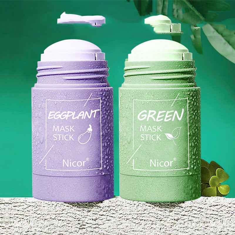Petra store Cleansing Green Tea Mask stick in green packaging alongside eggplant mask stick in purple packaging