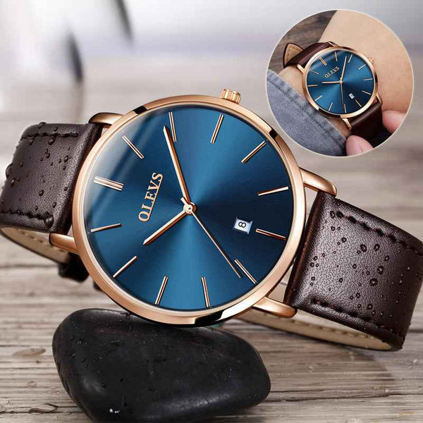 Petra store Leather Sports Watch with blue sunburst dial rose gold case brown perforated strap and date window