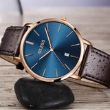 Petra store Leather Sports Watch rose gold case blue dial brown leather strap with date window and water droplets