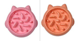 Petra store Pet Slow Feeder Bowl in pink and orange with raised patterns to slow pet eating