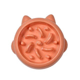 Petra store orange pet slow feeder bowl with raised patterns to promote healthy eating