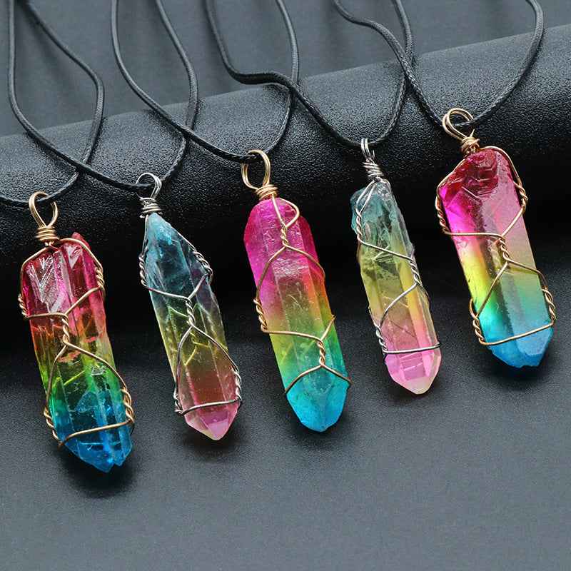 Colorful crystal pillar tree of life pendant wrapped in wire on black cord necklace from Petra store