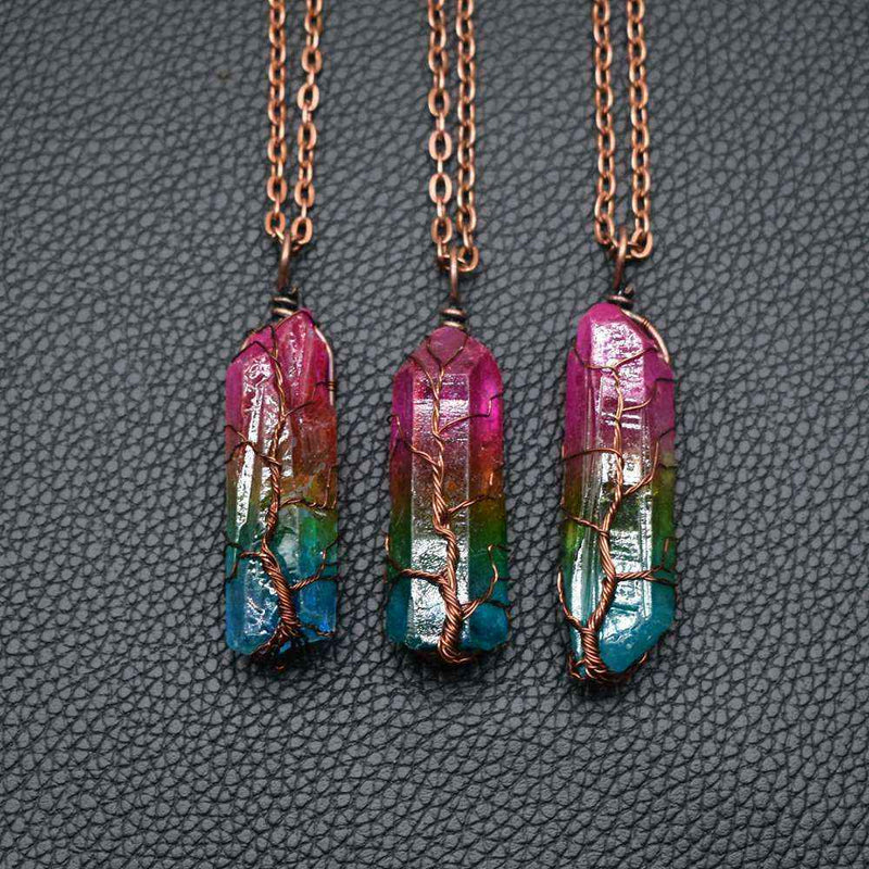 Colorful crystal Pillar Tree Of Life Pendant necklaces with copper wire wrapping on black textured background