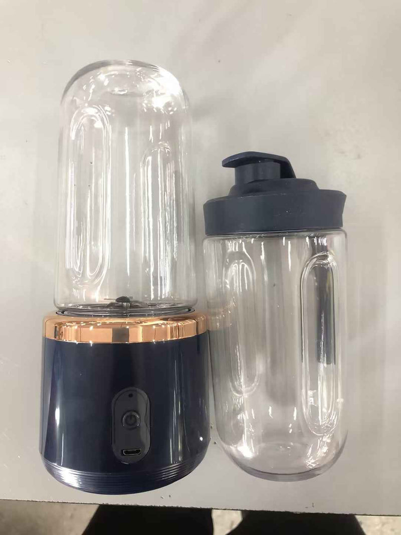 Petra store Portable Blender And Mini Juicer with dark base and clear blending jar and lid