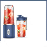 Petra store portable blender and mini juicer with blue base and container filled with fresh fruit juice