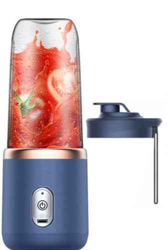 Petra store Portable Blender And Mini Juicer in blue with detachable lid and fresh tomato juice inside