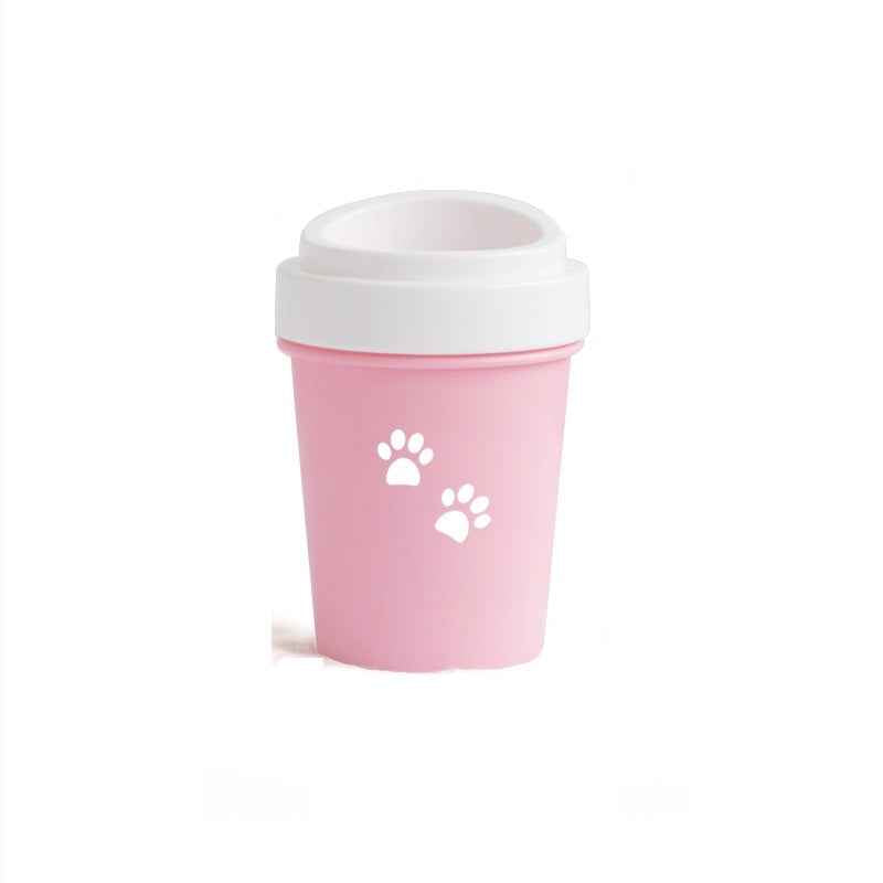Petra store portable pet paw cleaning tool in pink with white paw prints and a white lid