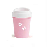 Petra store portable pet paw cleaning tool in pink with white paw prints and lid