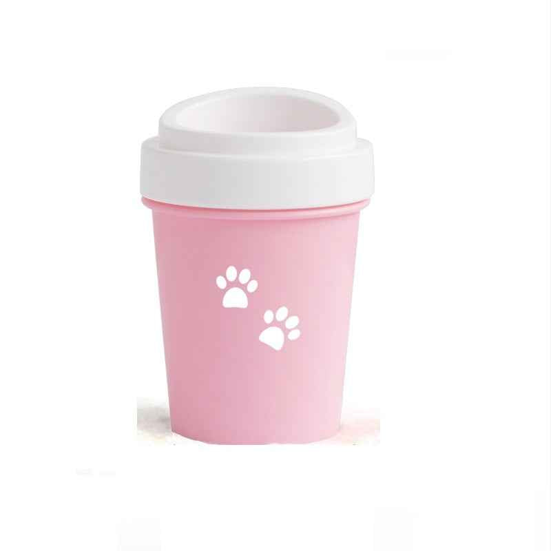 Petra store portable pet paw cleaning tool in pink with white paw prints and lid