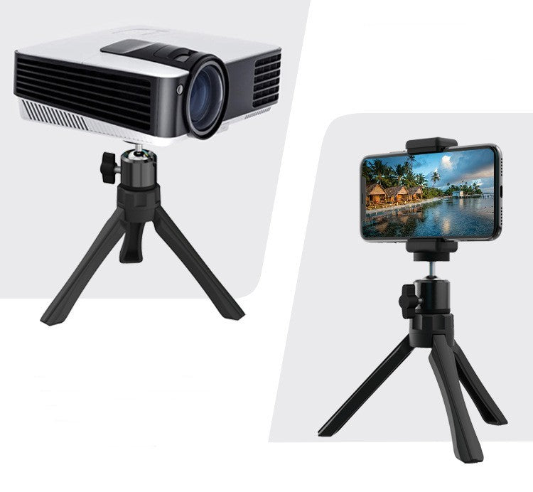 Portable phone tripod from Petra store holding a phone and a projector with adjustable legs
