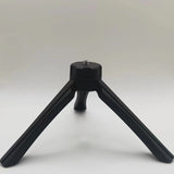 Black portable phone tripod with foldable legs for stable phone support from Petra store