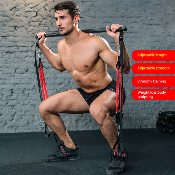 Man using portable home gym equipment with adjustable length and strength for weight loss and training