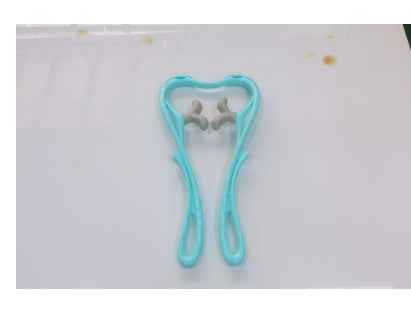 Petra store Six-Wheel Neck Massager handheld turquoise roller for neck and shoulder relief with ergonomic handles