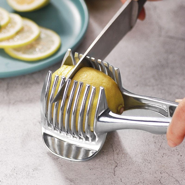Petra store lemon slicer cutting a lemon into even slices on a kitchen countertop